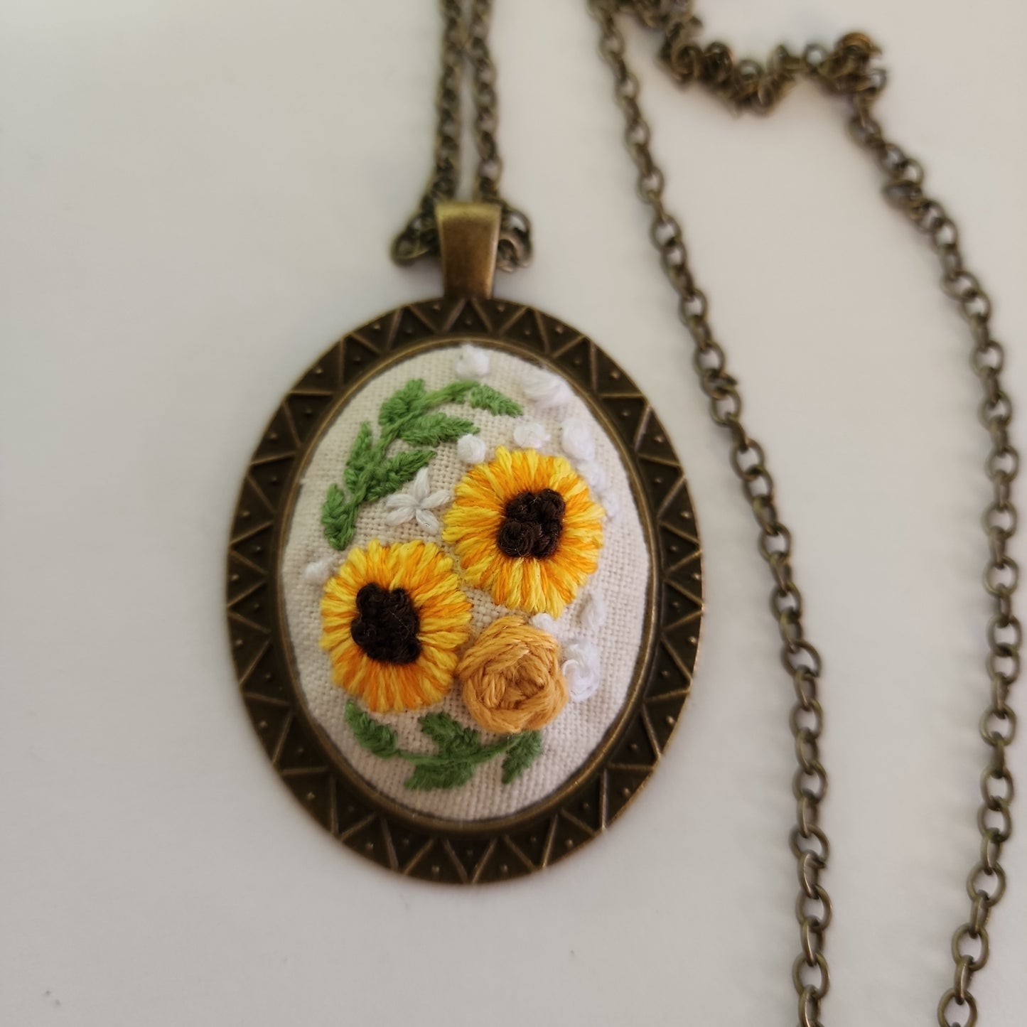 Embroidered cameo