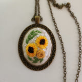 Embroidered cameo