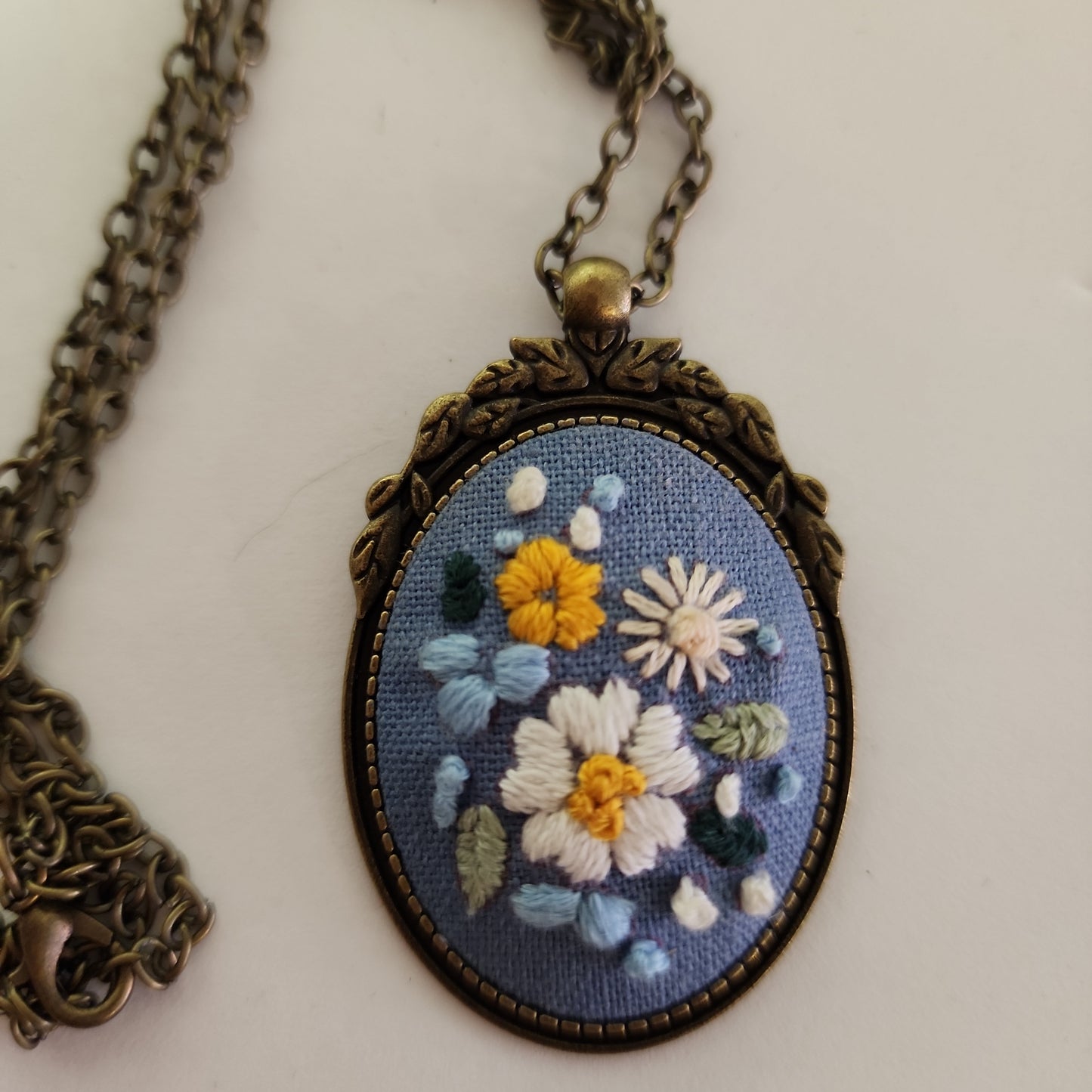 Embroidered cameo